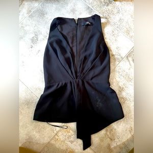 Sleeveless black blouse